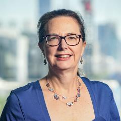 A professional staff headshot of Anna Jackson